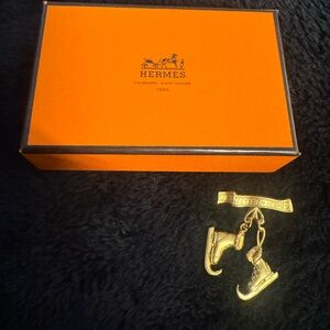 Hermes brooch “Les Fêtes en Hermès”